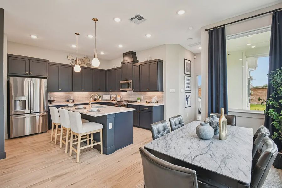 Furnished interior view inside a new home in Meridiana Chateau, Manvel (Image 13).