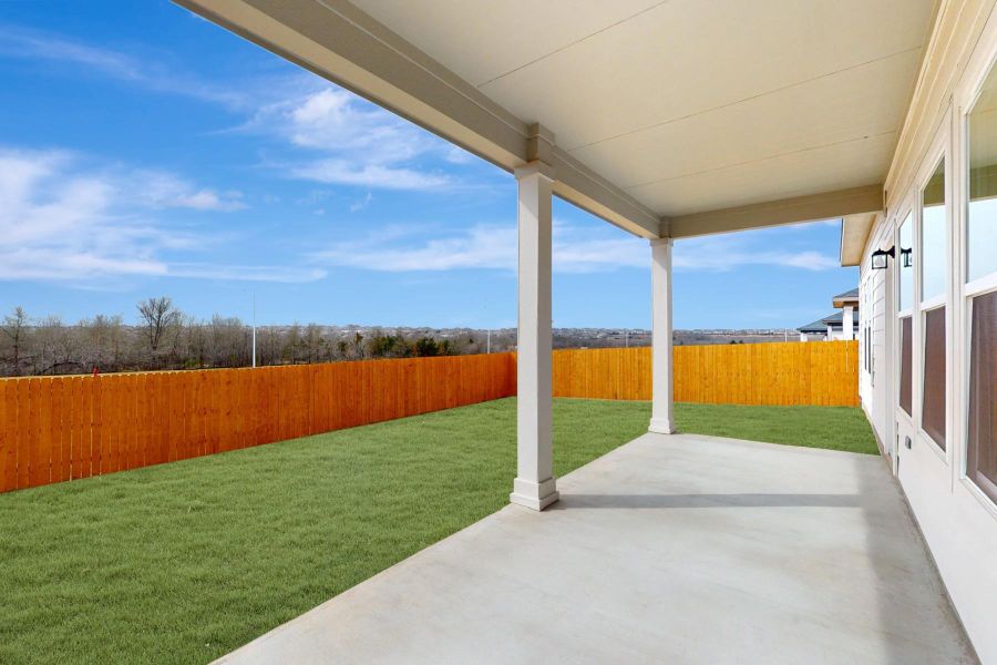 Exterior details and patio area of a home in Carillon, Manor (Image 19).