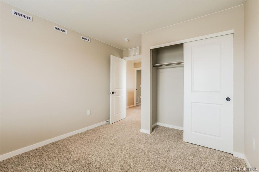 Spacious, unfurnished interior of a new home in Second Creek Farm, Commerce City (Image 17).