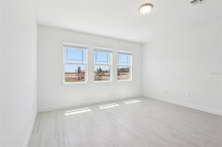 Spacious, unfurnished interior of a new home in Cyrene at Minneola - Villas, Montverde (Image 27).