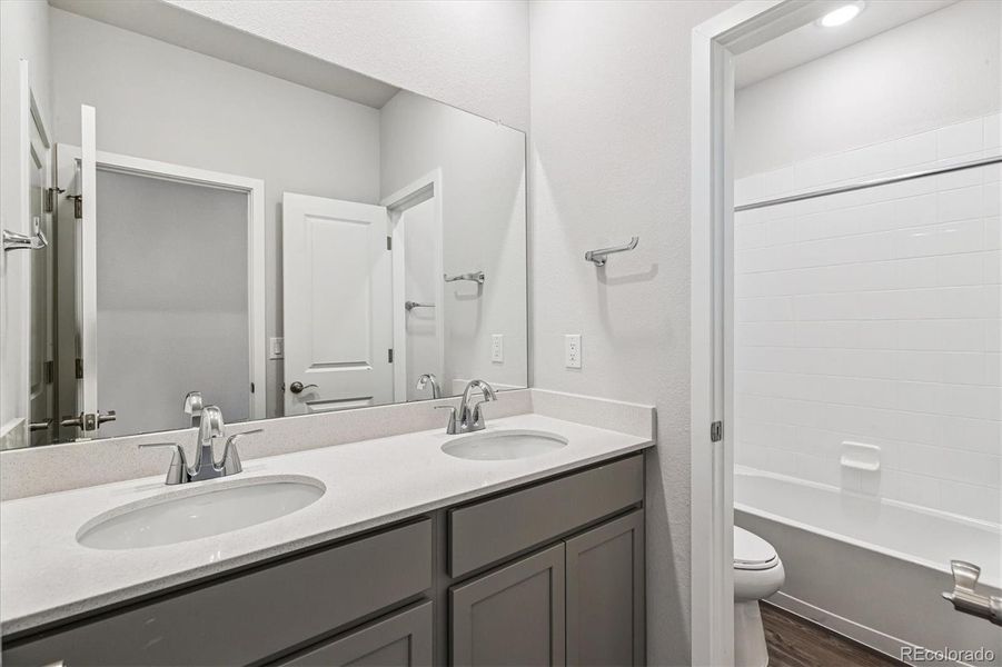 Furnished interior view inside a new home in Floret Collection at Alder Creek, Parker (Image 12).