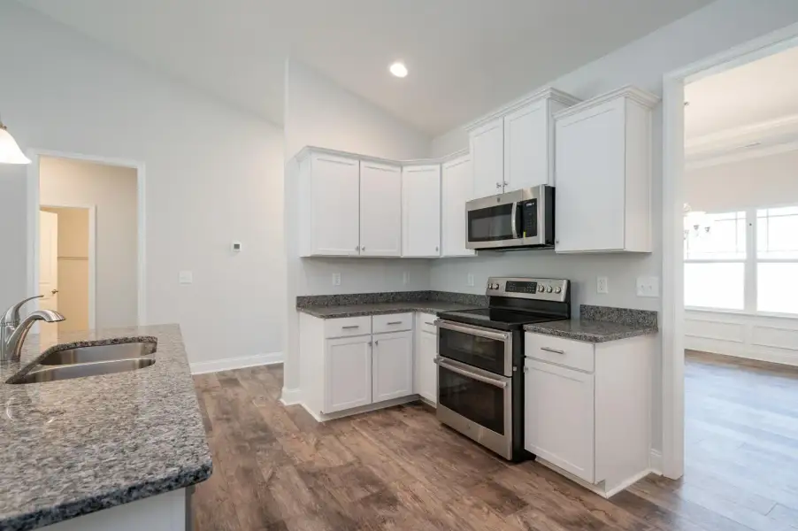 Representative furnished interior of a home built from the 2100 by Adams Homes in Ham Farm, La Grange (Image 7).
