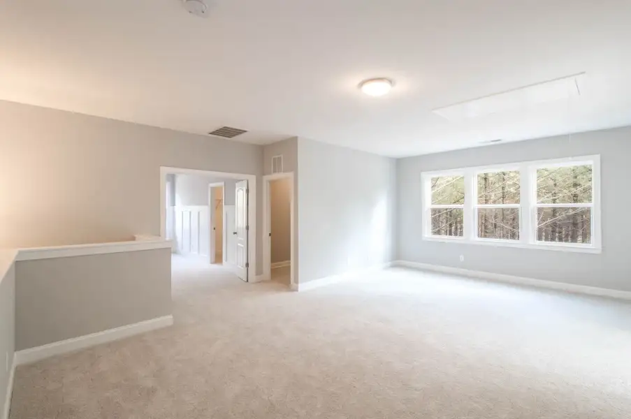 Representative unfurnished interior of a home built from the Pinehurst with 3rd Floor Retreat by Greybrook Homes in Shepherds Trace, Clover (Image 17).