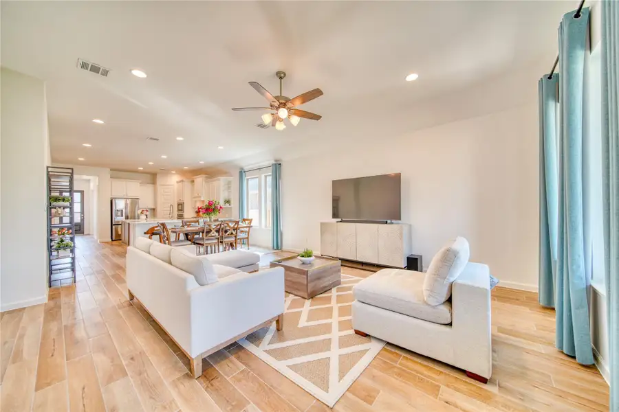 Furnished interior view inside a new home in Meridiana 40'/45', Manvel (Image 6).