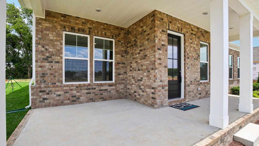 Exterior front entryway with covered porch Exterior front entryway with covered porch