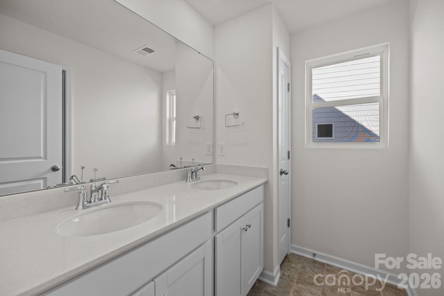 Furnished interior view inside a new home in McFarland Estates, York (Image 8).
