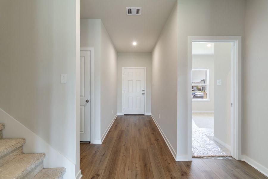 Representative unfurnished interior of a home built from the Guadalupe by Omega Builders in Hillside Village, Temple (Image 4).
