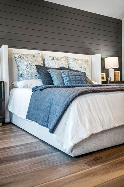 Primary bedroom in the model home located in Carillon at 13305 Eppright Trace Blvd., Manor, TX Primary bedroom in the model home located in Carillon at 13305 Eppright Trace Blvd., Manor, TX