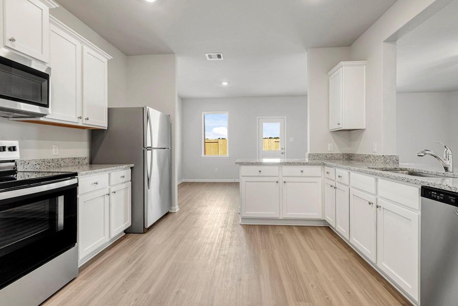 Furnished interior view inside a new home in Cypress Trails at Bauer Landing, Hockley (Image 4).