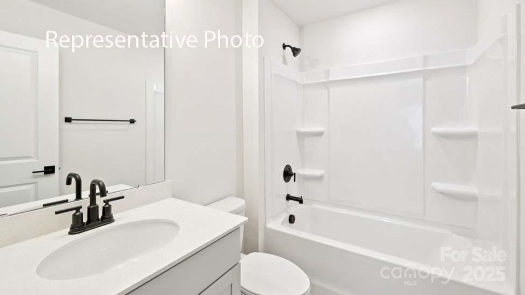 Furnished interior view inside a new home in Sanctuary at Southgate, Indian Trail (Image 1).