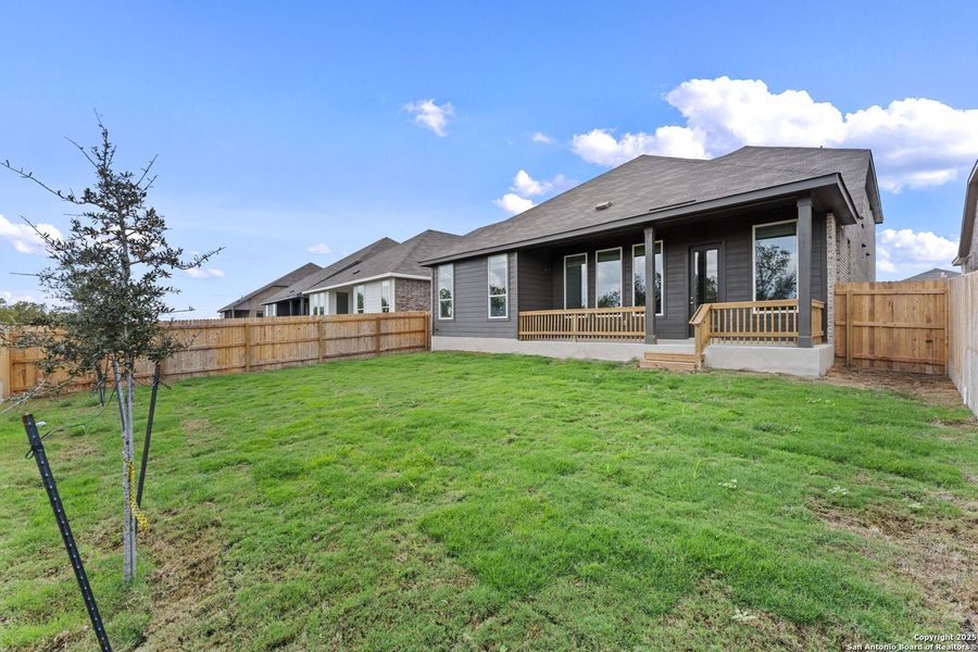 Exterior details and patio area of a home in , New Braunfels (Image 2).