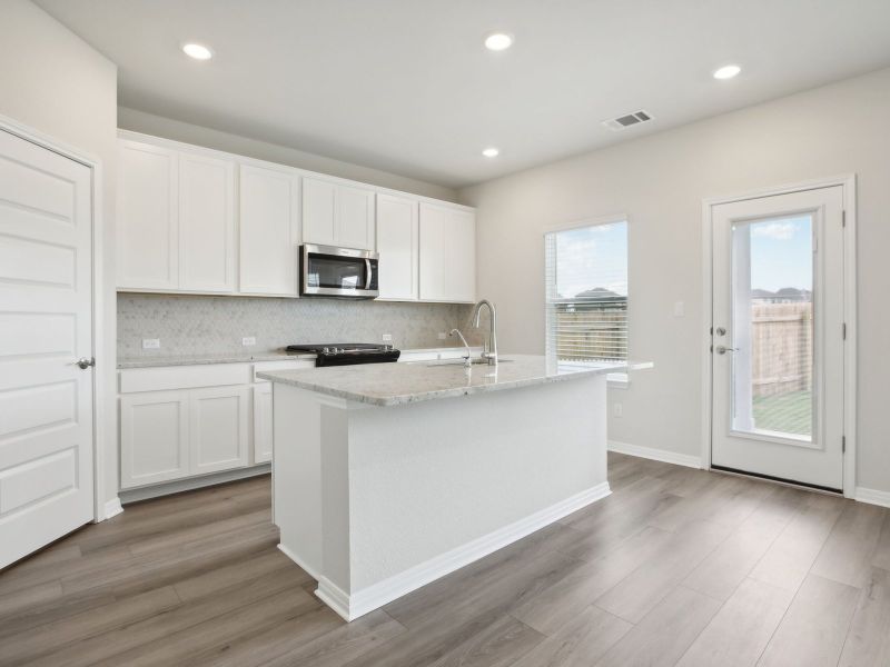 Cook your favorite meal in this beautiful kitchen.