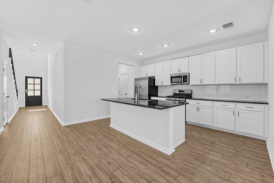 Furnished interior view inside a new home in Sunfield, Buda (Image 18).