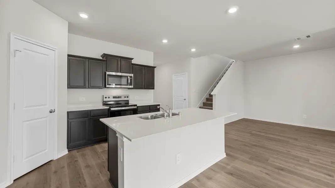 Furnished interior view inside a new home in Crane Crossing, Crandall (Image 4).