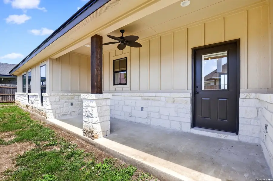 Exterior details and patio area of a home in , Poth (Image 4).