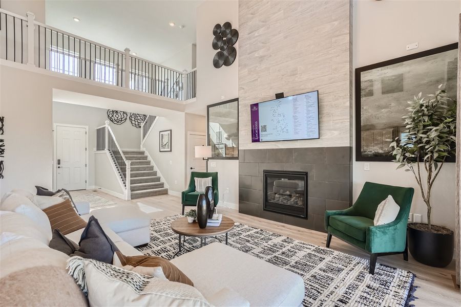 A living room with a fireplace. A living room with a fireplace.