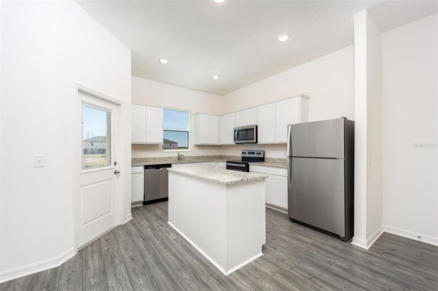 Furnished interior view inside a new home in Sol Vista, Dundee (Image 7).
