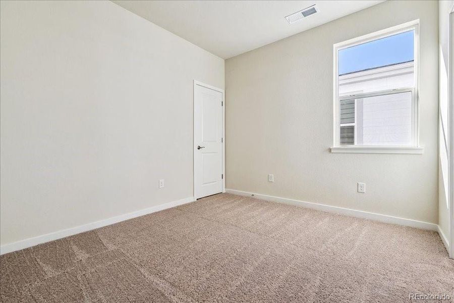 Spacious, unfurnished interior of a new home in Floret Collection at Alder Creek, Parker (Image 20).