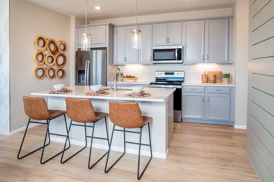 Representative furnished interior of a home built from the 1755 by KB Home in Windler Midtown Villas, Aurora (Image 3).