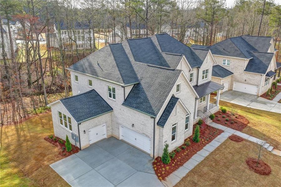 Front exterior of a new home in , Cumming, GA, highlighting curb appeal (Image 24).