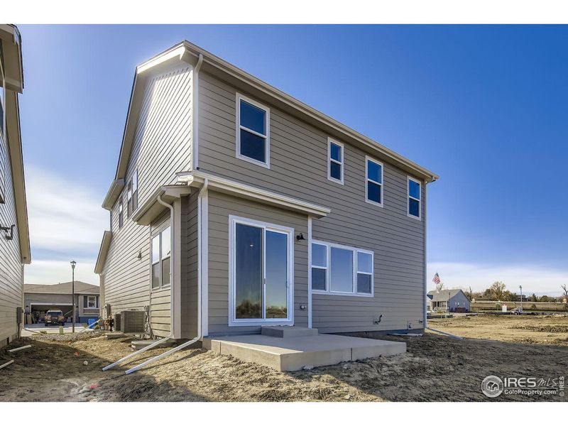 Exterior details and patio area of a home in Country Club Reserve – Fort Collins, Fort Collins (Image 26).