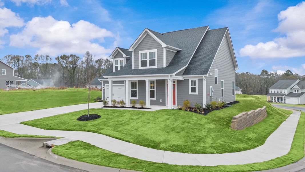 Eye-catching exterior with timeless color palette and superior architectural detail Eye-catching exterior with timeless color palette and superior architectural detail