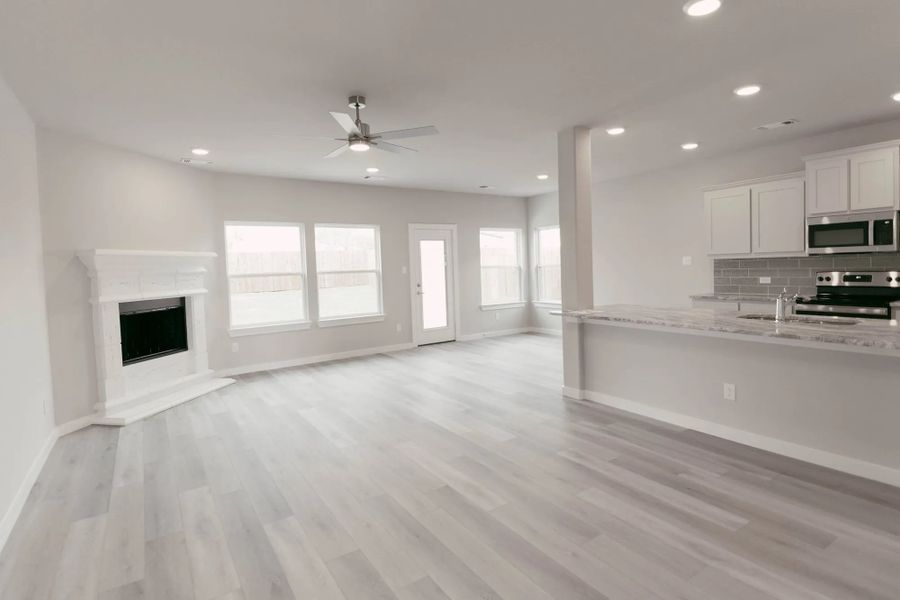Representative furnished interior of a home built from the Hudson by Stonehollow Homes in Heritage Grove, Blue Ridge (Image 9).