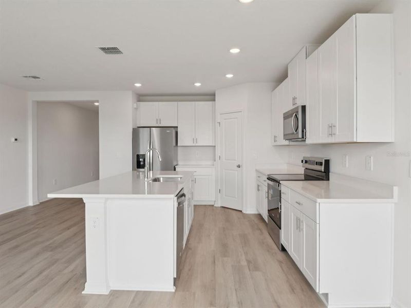 Furnished interior view inside a new home in Salt Meadows - Classic Series, Parrish (Image 3).