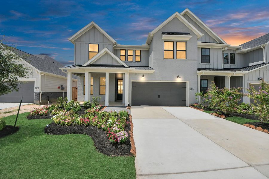 Front exterior of a new home in Bridgeland: Signature Collection, Cypress, TX, highlighting curb appeal (Image 1).