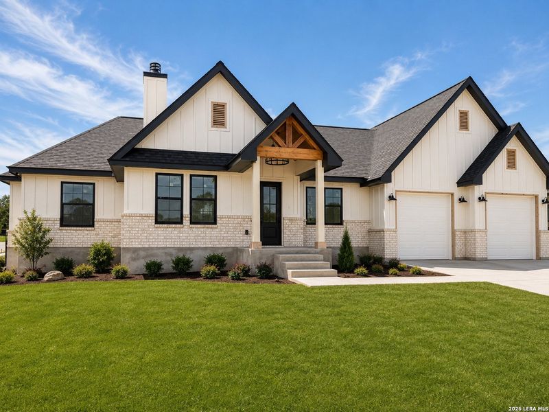 Front exterior of a new home in , La Vernia, TX, highlighting curb appeal (Image 2). Front exterior of a new home in , La Vernia, TX, highlighting curb appeal (Image 2).