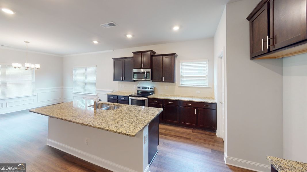 Furnished interior view inside a new home in Holliday Pass, Griffin (Image 9).