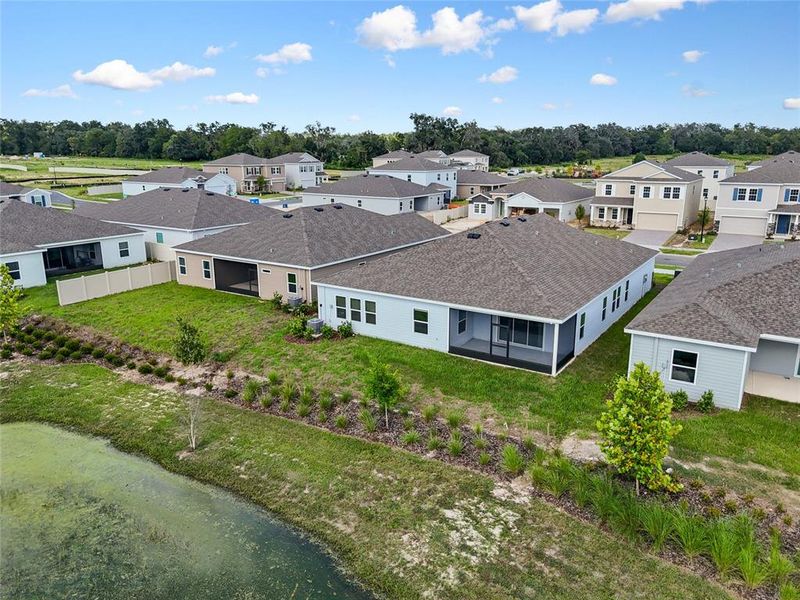 Front exterior of a new home in , Newberry, FL, highlighting curb appeal (Image 24).