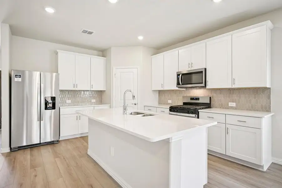 Photo is not of the actual home, but is an inspirational photo of builder’s model home and may depict options, furnishings, and/or decorator features that are not included.
