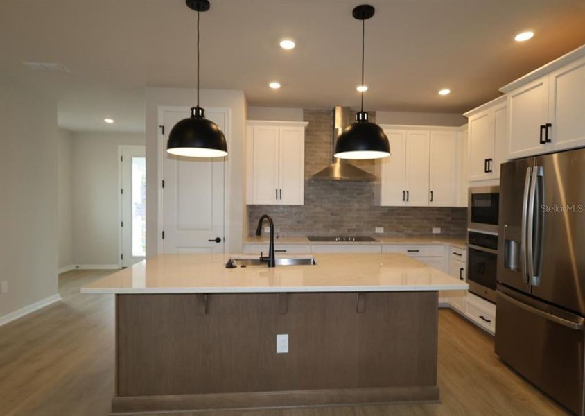 Furnished interior view inside a new home in Weslyn Park in Sunbridge 34', St. Cloud (Image 8). Furnished interior view inside a new home in Weslyn Park in Sunbridge 34', St. Cloud (Image 8).