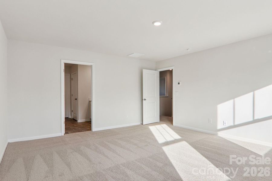 Spacious, unfurnished interior of a new home in Rydele Heights, Asheville (Image 25).