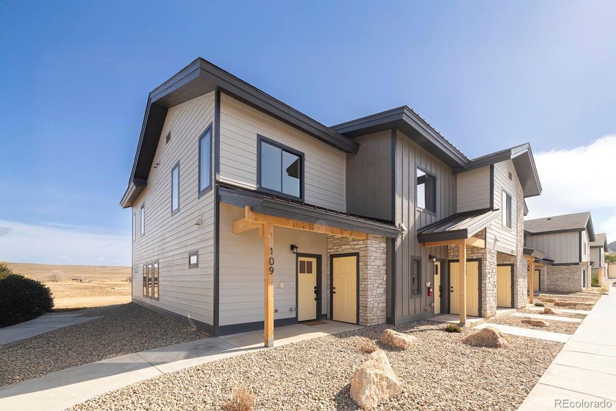 Front exterior of a new home in , Granby, CO, highlighting curb appeal (Image 2). Front exterior of a new home in , Granby, CO, highlighting curb appeal (Image 2).