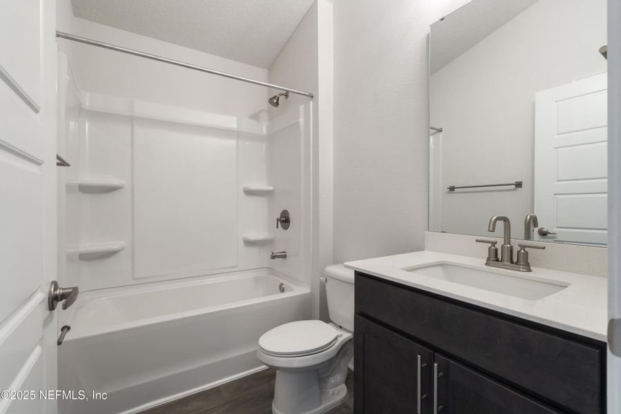 Furnished interior view inside a new home in Shadow Crest at Rolling Hills, Green Cove Springs (Image 7).