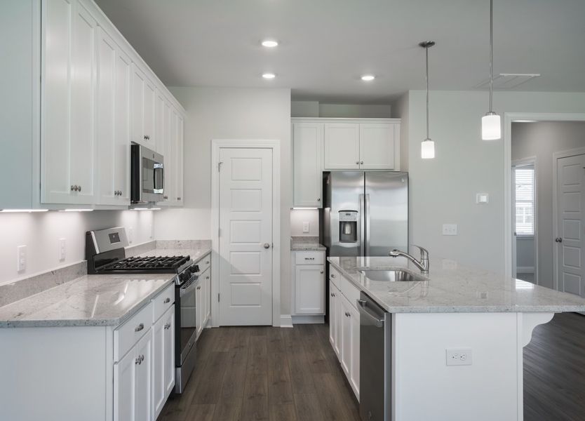 Representative furnished interior of a home built from the The McKee by Cothran Homes in Holly Ridge, Greenville (Image 7). Representative furnished interior of a home built from the The McKee by Cothran Homes in Holly Ridge, Greenville (Image 7).