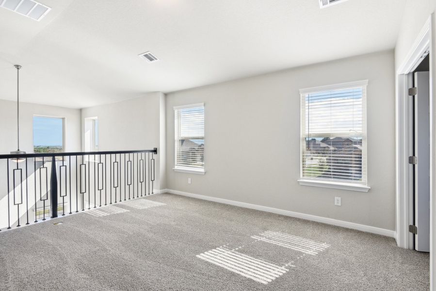 Second floor landing in the Medina floorplan at a Meritage Homes community.