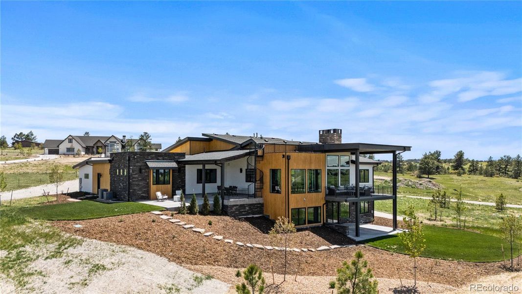 Front exterior of a new home in , Franktown, CO, highlighting curb appeal (Image 18).