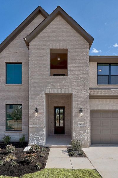 Front exterior of a new home in Nolina, Georgetown, TX, highlighting curb appeal (Image 23).