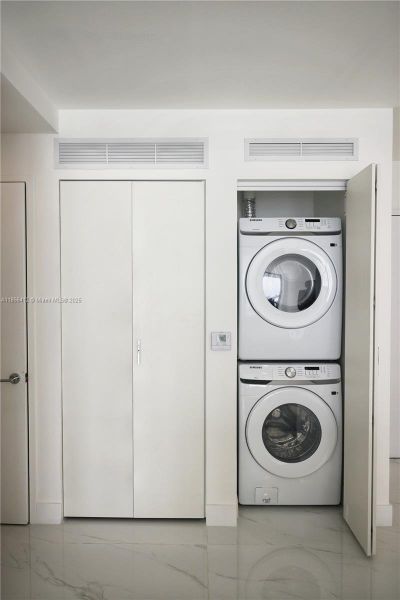 Furnished interior view inside a new home in Aria Reserve, Miami (Image 9).