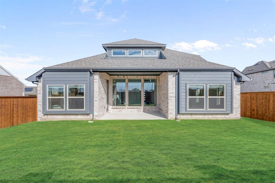 Exterior details and patio area of a home in Creekview Meadows, Pilot Point (Image 4).