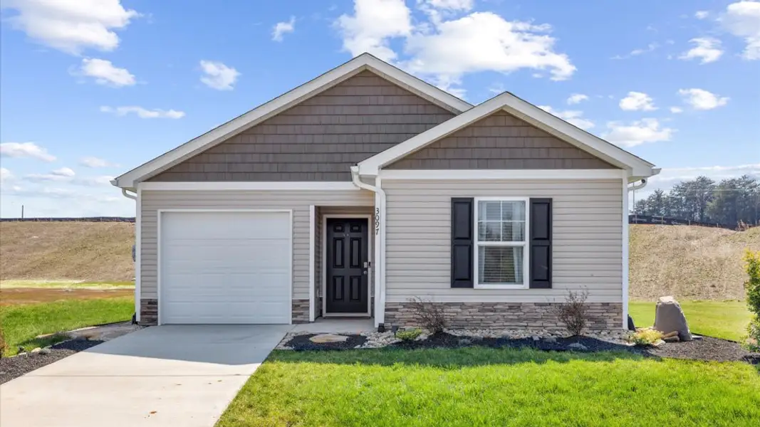 Representative exterior photo of a completed home built from the Sullivan by D.R. Horton in Creekside Ridge, Dandridge, TN (Image 1).