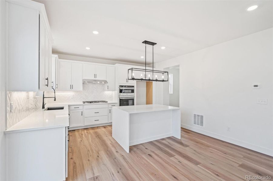 Furnished interior view inside a new home in Windsong, Thornton (Image 12).