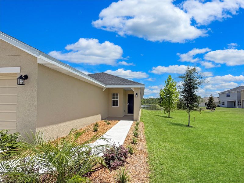 Exterior details and patio area of a home in Harmony Central, St. Cloud (Image 3).