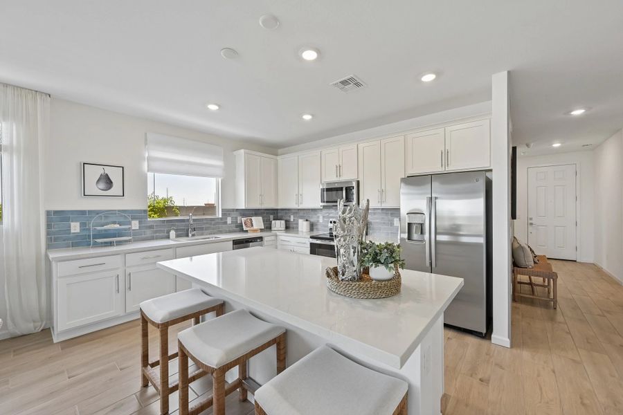 Kitchen featuring the Coastal Collection. Model home, finishes may vary. Kitchen featuring the Coastal Collection. Model home, finishes may vary.