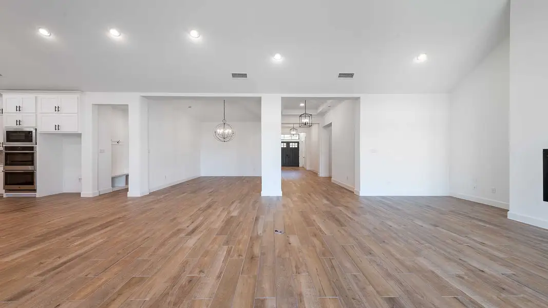 Representative unfurnished interior of a home built from the 4411W by Perry Homes in Enchanted Creek, Allen (Image 17).