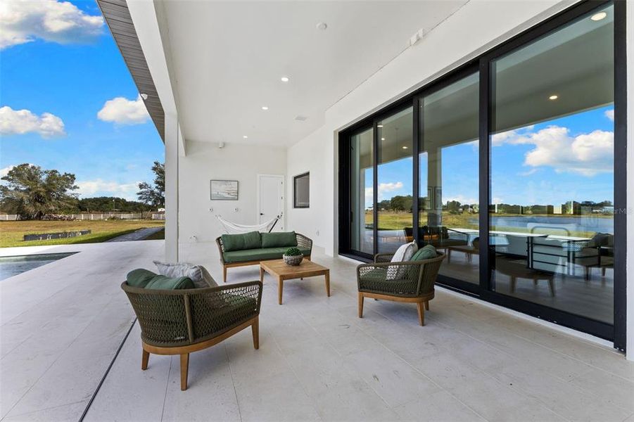 Exterior details and patio area of a home in , Myakka City (Image 27).