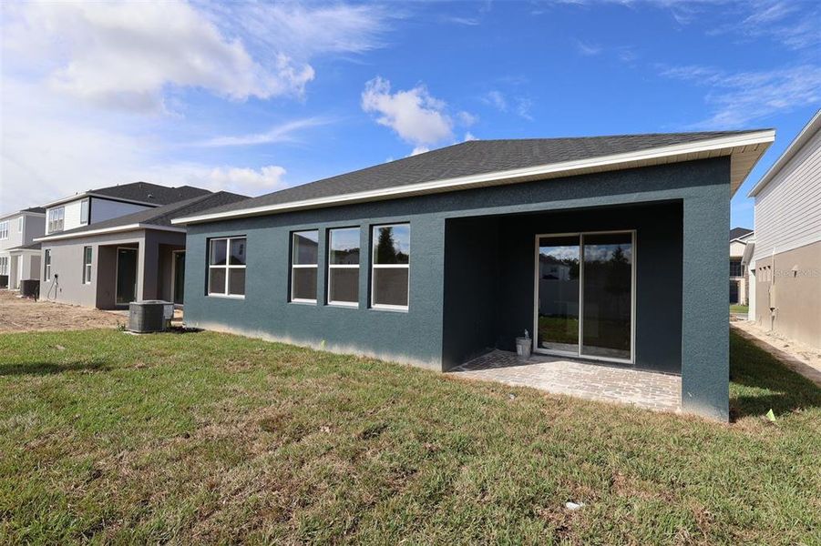 Exterior details and patio area of a home in Estates at Rivercrest, Sanford (Image 21).